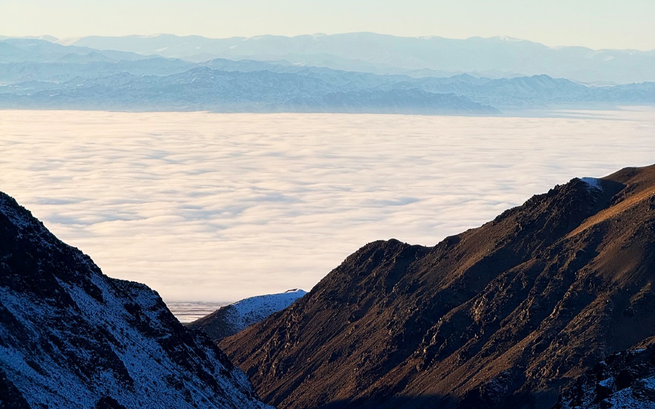 "In the serene heights, the mountains rise above the clouds." Photo by Uugaa. B | Premium Travel Mongolia